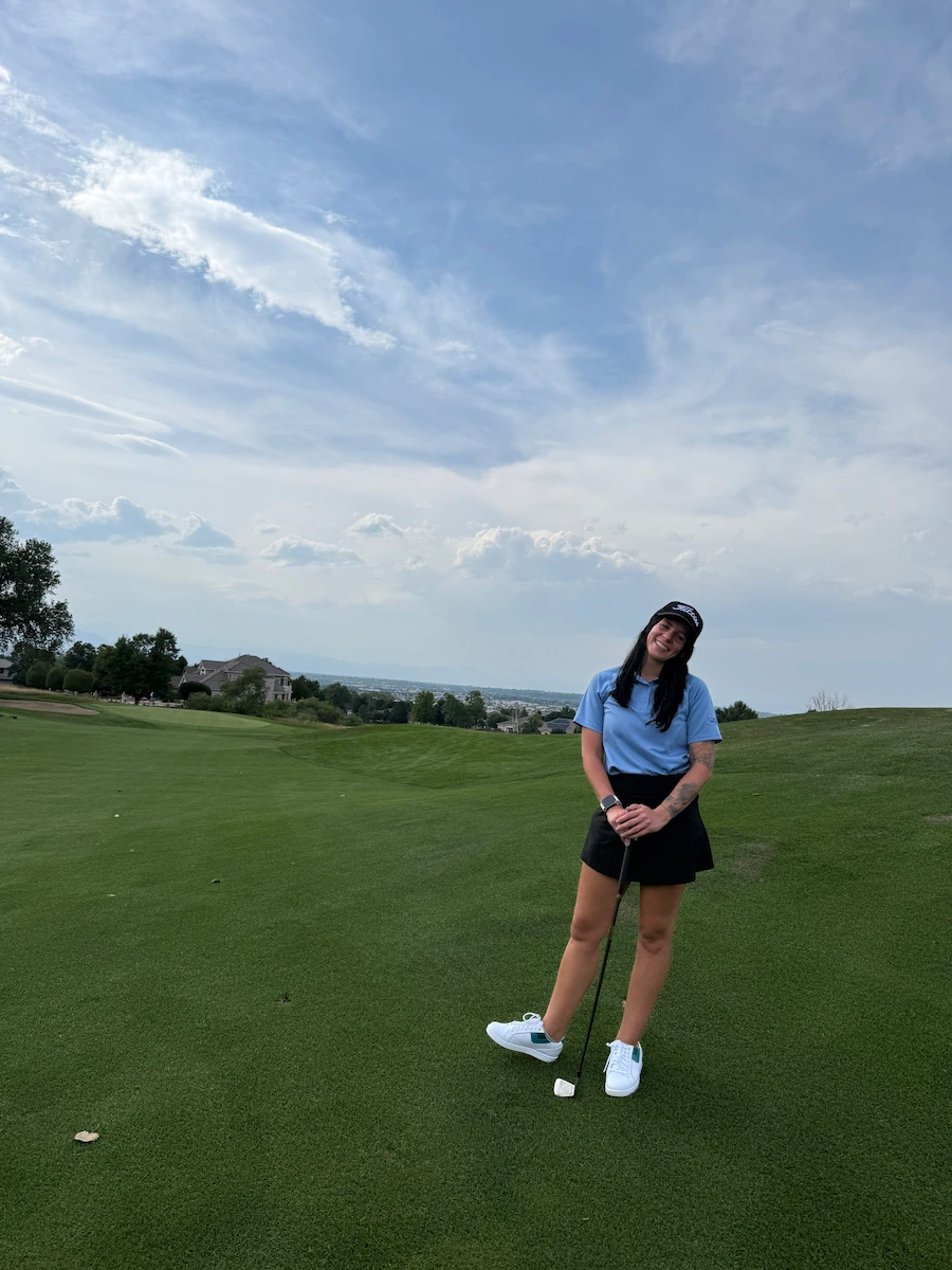 Jess enjoying a round of golf in Colorado